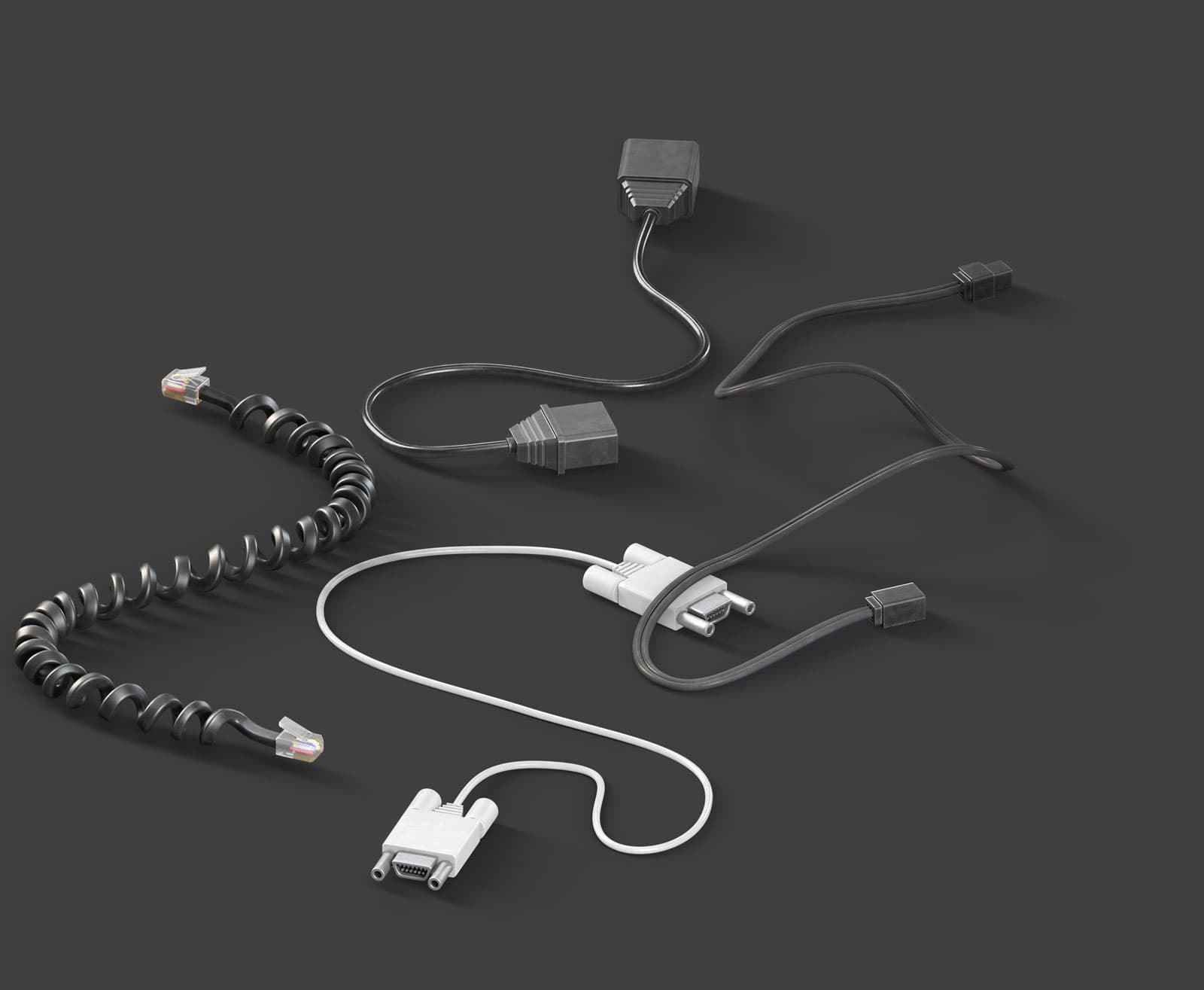 messy computer cables over a grey background