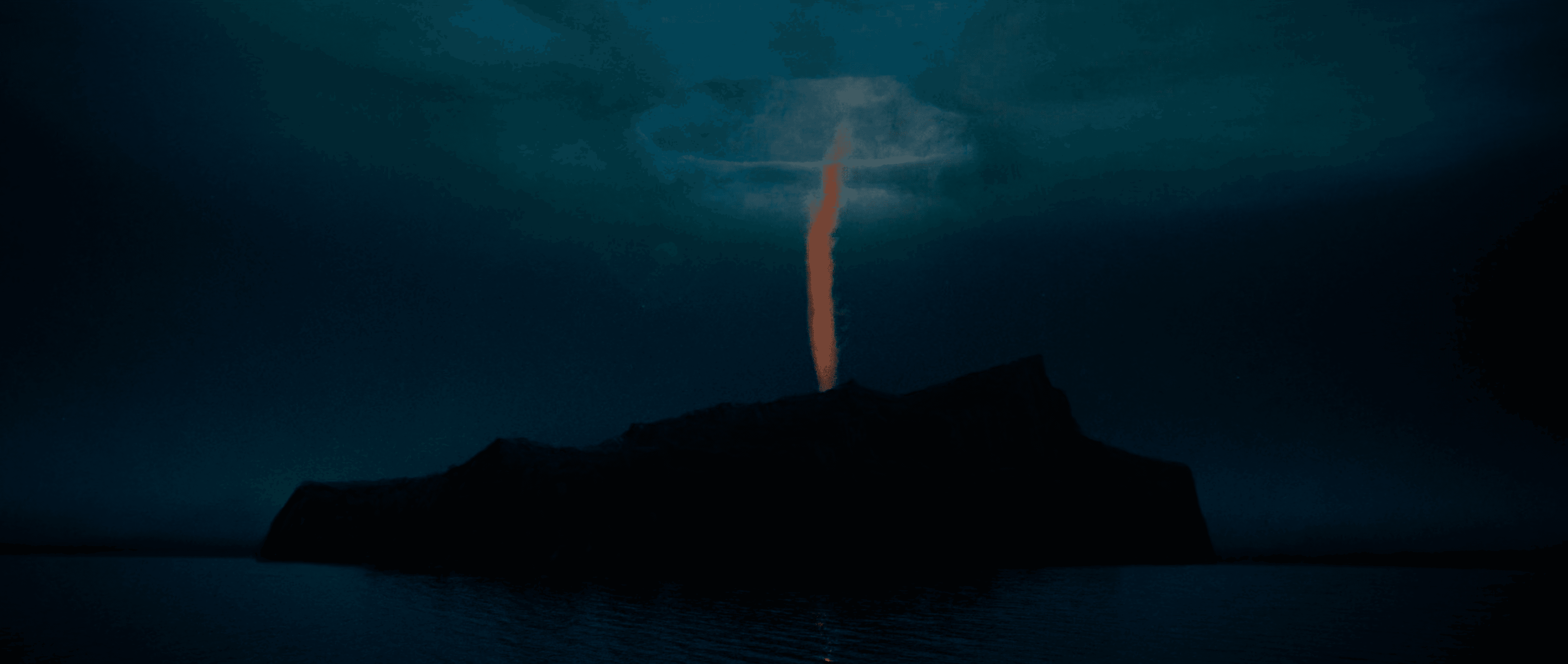 A nighttime scene of a mountain with a fire vortex going into an opening the clouds overhead