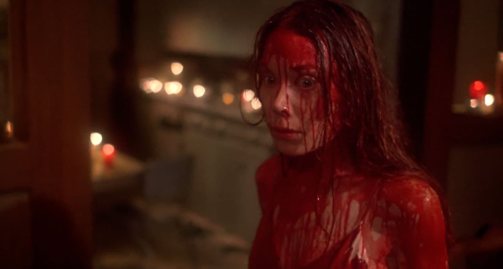 Carrie covered in red blood
