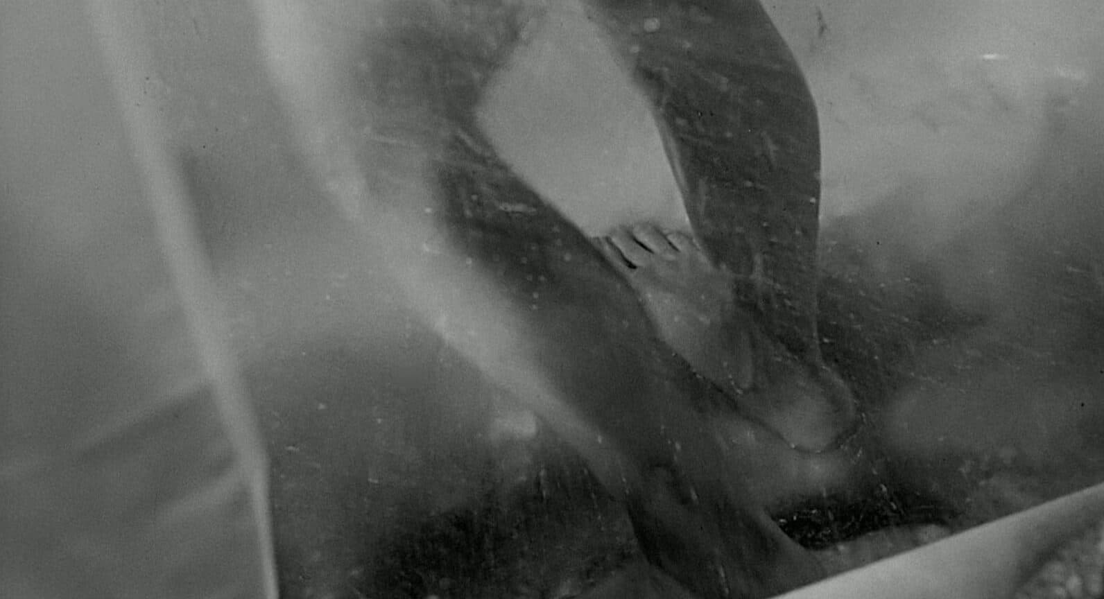 chocolate syrup as fake blood being washed down the shower drain