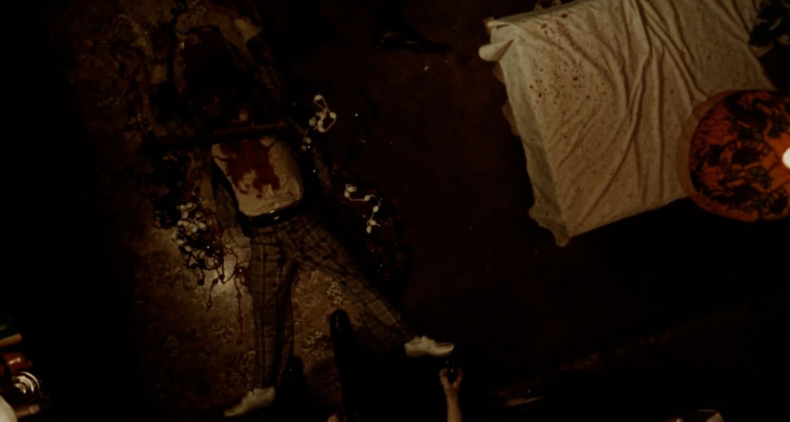 overhead view of a body covered in blood