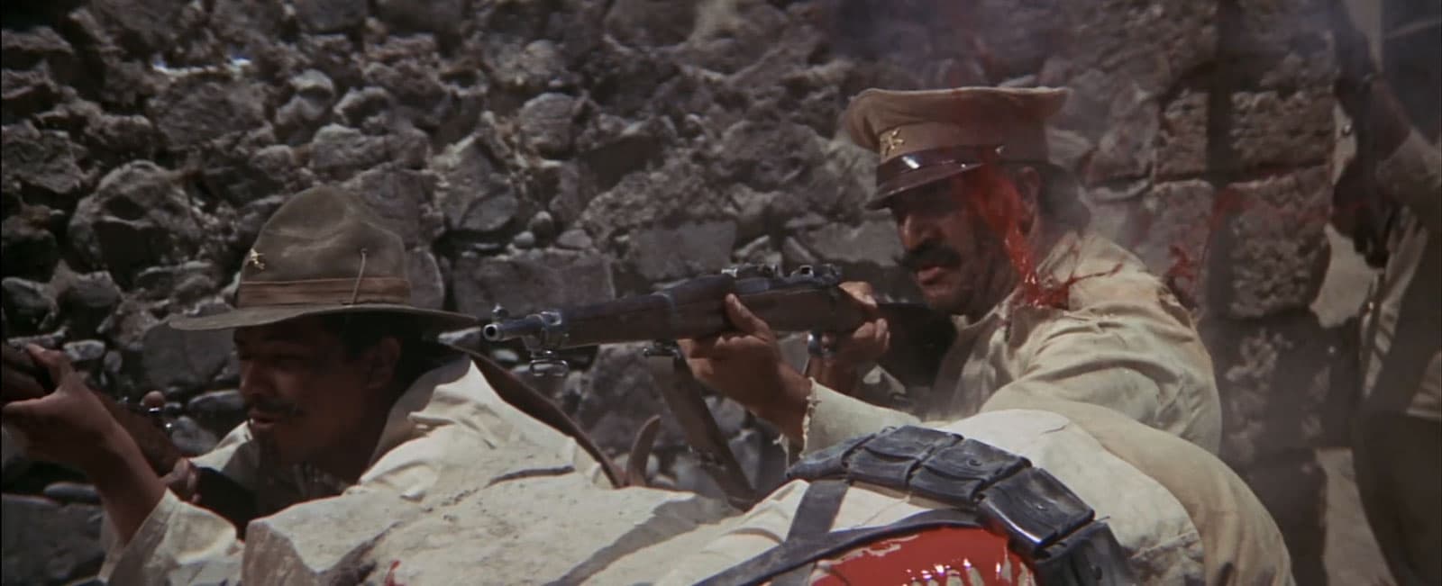 fake blood spraying from the shoulder of a soldier